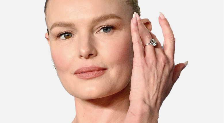 Kate Bosworth displaying her engagement right and unique eye color.